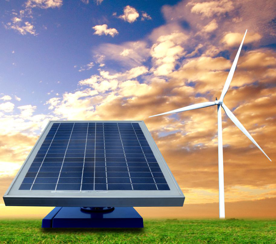 A solar panel in the foreground with a wind turbine in the background, set against a vibrant sky with clouds.
