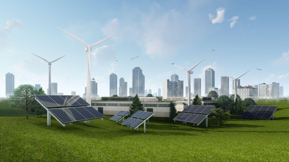 Solar panels and wind turbines installed on a green field near a modern city skyline, with birds flying overhead, representing the integration of renewable energy sources into an urban environment.